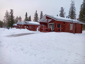 Фото номера Шале с двумя спальнями Кемпинги Ristijärven Pirtti Cottage Village г. Ристиярви 2