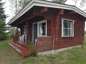 Фото номера Пляжный коттедж Кемпинги Ristijärven Pirtti Cottage Village г. Ристиярви 3